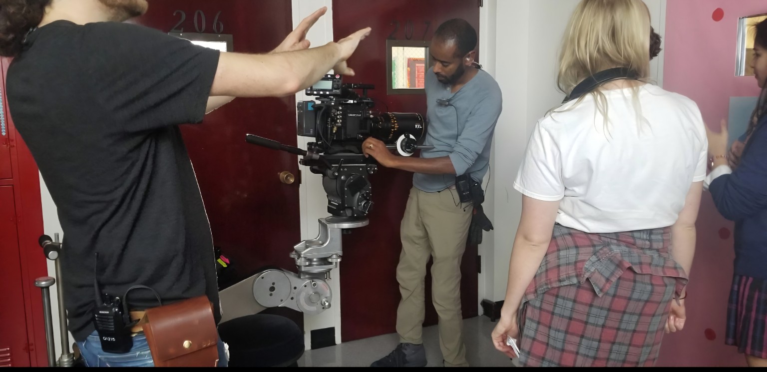 Camera crew working with a cinema camera